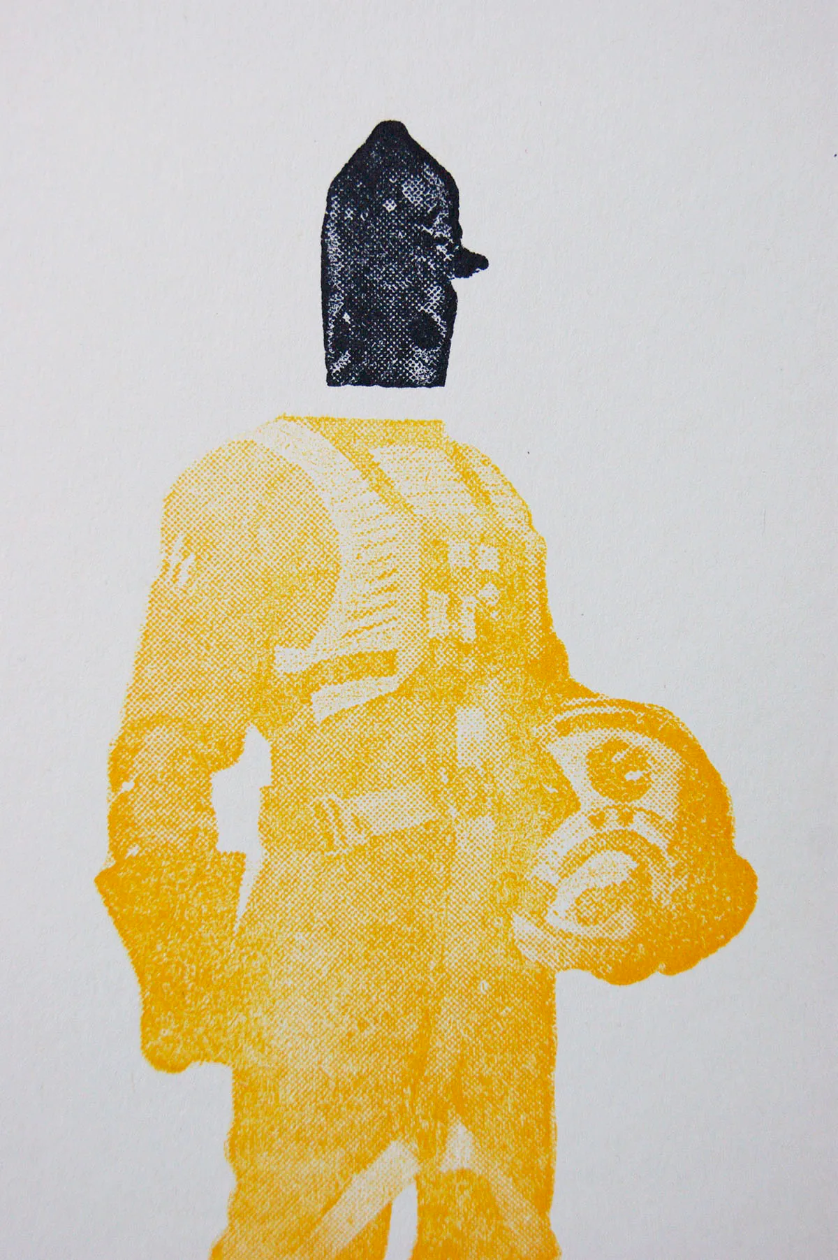 Detail of a halftone letterpress figure printed in yellow with a solid black head, showing visible dot texture